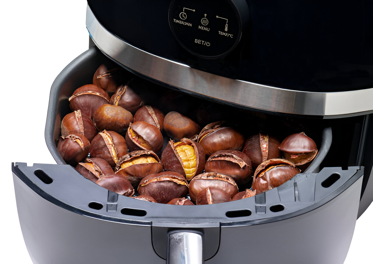A close-up view of roasted chestnuts in an air fryer.