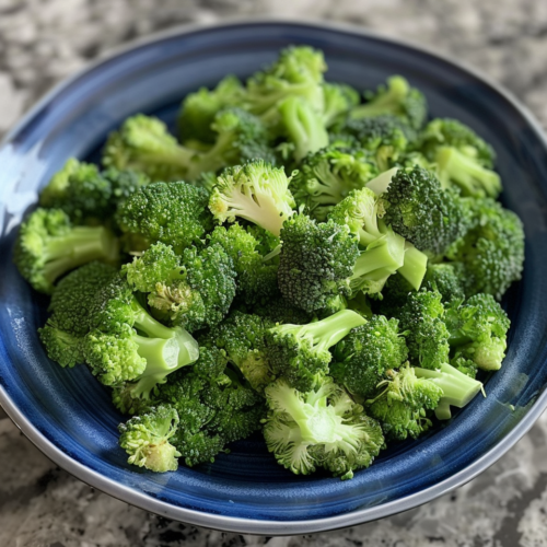 Broccoli Salad taken with iphone 15 pro max --iw 2 --ar 4:5 --v 6.0 --raw