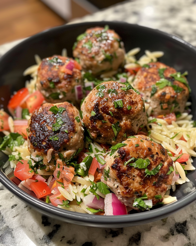 Greek Turkey Meatballs With Orzo Salad taken with iphone 15 pro max --iw 2 --ar 4:5 --v 6.0 --raw
